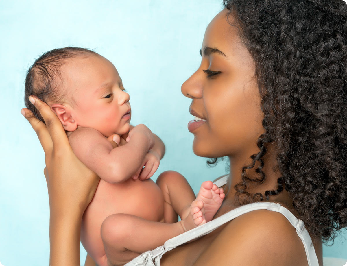 an image of a woman holding her baby